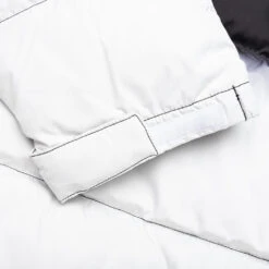 The North Face 1996 Nuptse Dip Dye Jacket - Black -Fashion Clothing Store 1996 NUPTSE Dip Dye Jacket Black NF0A84QWMTT 09 30 23 Feature JP 9