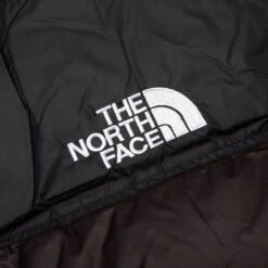 The North Face 1996 Retro Nuptse Jacket - Coal Brown/Tan -Fashion Clothing Store 1996 Retro NUPTSE Jacket Coal Brown Tan NF0A3C8DLOS 09 30 23 Feature JP 7