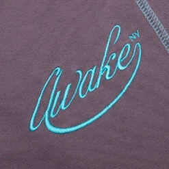 Awake Script Logo Sweatpant - Aubergine -Fashion Clothing Store Awake Contrast Stitch Script Logo Sweatpant Aubergine AWK SP22 SP002 AUB 07 25 22 Feature NIKKA 2