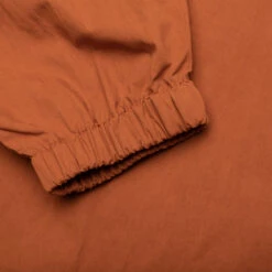 King Logo Twill Coaches Jacket - Rust -Fashion Clothing Store Awake NY King Logo Twill Coaches Jacket Rust AWK SP23 OT007 RUS 05 28 23 Feature KN 8