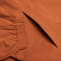 King Logo Twill Coaches Jacket - Rust -Fashion Clothing Store Awake NY King Logo Twill Coaches Jacket Rust AWK SP23 OT007 RUS 05 28 23 Feature KN 9