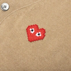 Comme Des Garcons PLAY X The Artist Invader Cardigan - Camel -Fashion Clothing Store Comme des Garcons PLAY x the Artist Invader Cardigan Camel AZ N084 051 3 06 02 23 Feature KN 7