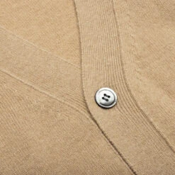 Comme Des Garcons PLAY X The Artist Invader Cardigan - Camel -Fashion Clothing Store Comme des Garcons PLAY x the Artist Invader Cardigan Camel AZ N084 051 3 06 02 23 Feature KN 8