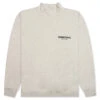 Essentials Core Mockneck - Light Oatmeal -Fashion Clothing Store Fear of God Essentials Core Mockneck Light Oatmeal 192BT212132F 07 24 22 Feature JM 2 DV