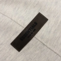 Essentials Core Sweatpants - Light Oatmeal -Fashion Clothing Store Fear of God Essentials Core Sweatpants Light Oatmeal 130BT212032F 07 26 22 Feature VR 4