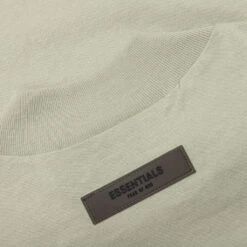 Essentials Kid's Big E Pocket Tee - Seafoam -Fashion Clothing Store Fear of God Essentials Kid s Big E Pocket Tee Seafoam 785BT214164K 05 05 22 Feature 5