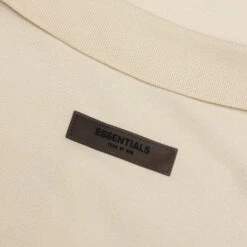 Essentials L/S Polo - Egg Shell -Fashion Clothing Store Fear of God Essentials L S Polo Egg Shell 192SU224190F 01 09 23 Feature VR 7