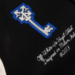 EMB Graphics Leather Varsity - Black/Blue -Fashion Clothing Store Off White c o Virgil Abloh EMB Graphics Leather Varsity Black Blue OMJA097S23LEA0011069 04 30 23 Feature KN 8