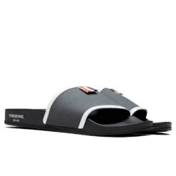 Rubber Pool Slide - Dark Grey -Fashion Clothing Store Thom Browne Rubber Pool Slide Dark Grey MFL054A 05690 025 08 30 22 Feature JORDAN 2