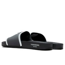 Rubber Pool Slide - Dark Grey -Fashion Clothing Store Thom Browne Rubber Pool Slide Dark Grey MFL054A 05690 025 08 30 22 Feature JORDAN 3